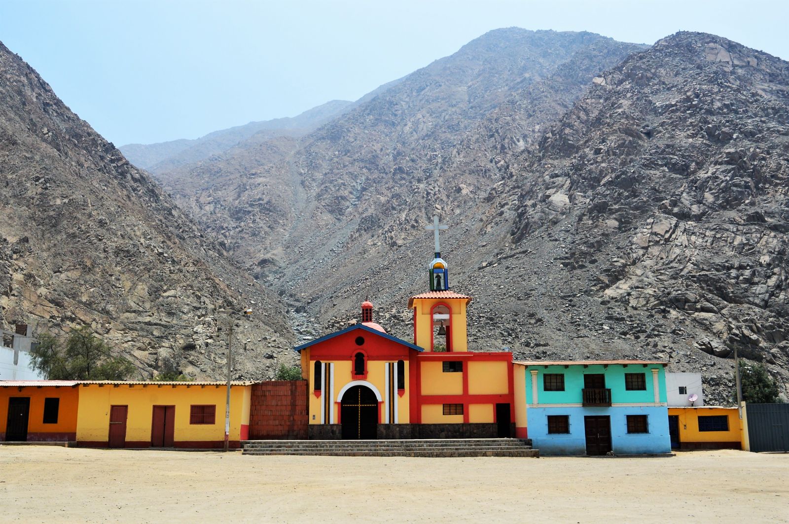 Small colorful villages are shining in the grey desert